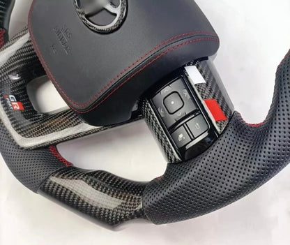 TOYOTA Hilux (2012-2024) - Carbon Fiber + Leather Steering Wheel